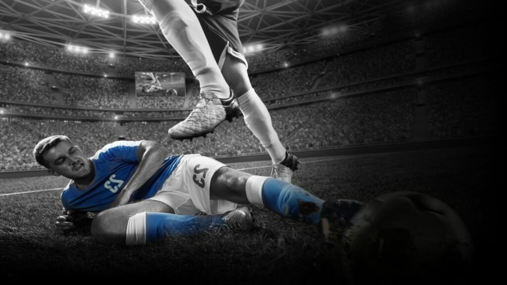 Sport Fanatico - Foot player tackling his opponent